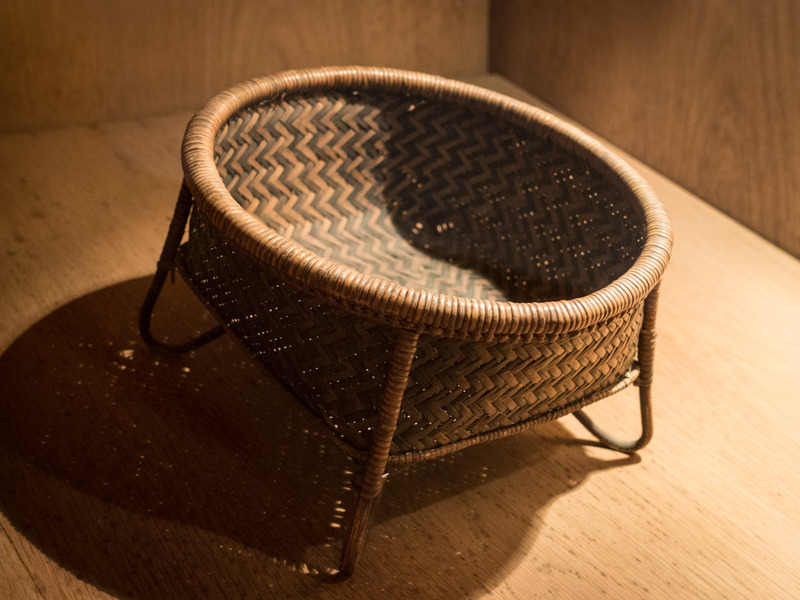 woven basket with feet