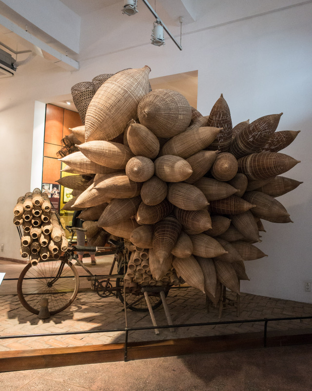 bicycle covered in woven fish traps