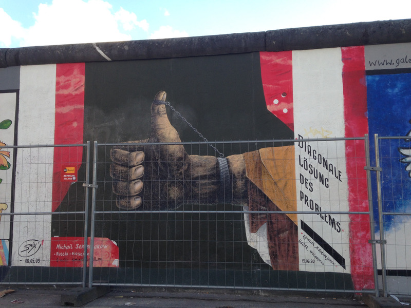 Berlin Wall graffiti: Russian thumb