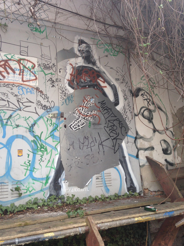 graffitied woman, accompanied by random scrawls