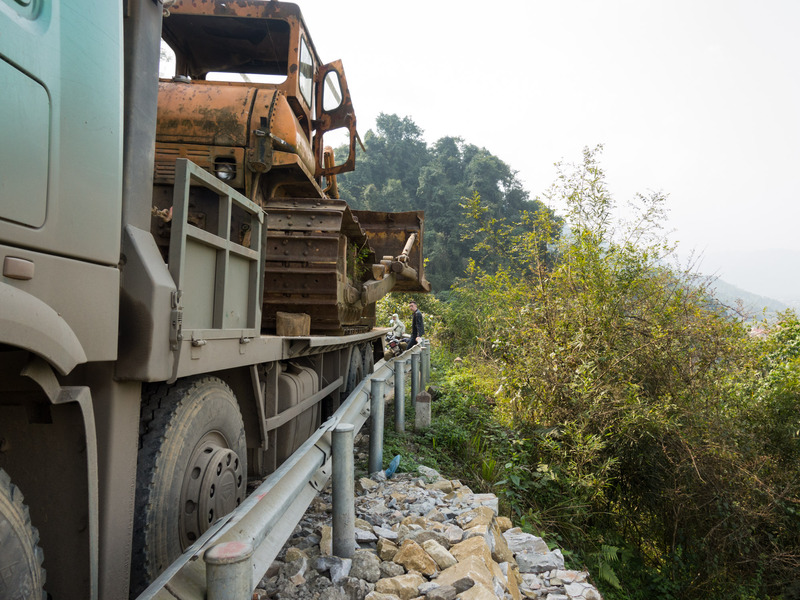 truck side, right next to the guard rail