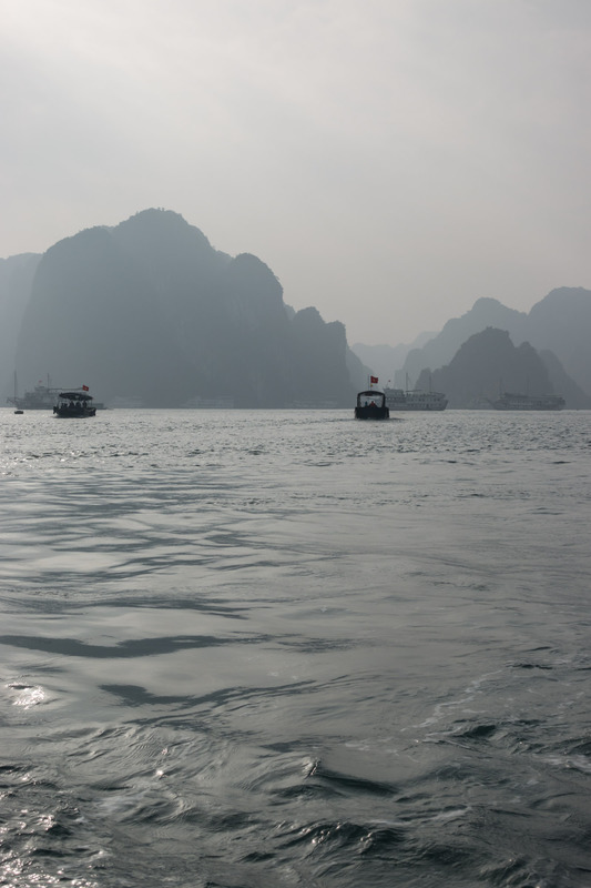 rocks and boats in silhouette