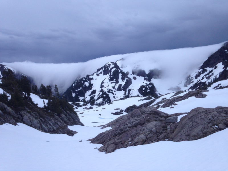 fog pouring over the mountains