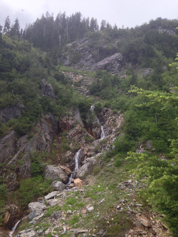 waterfall cascading down a rocky hill