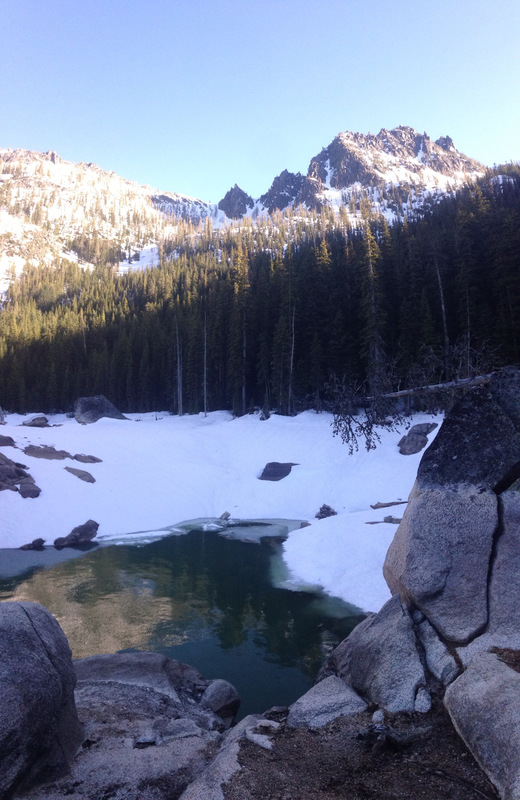 the bank of the lake, with submerged snow