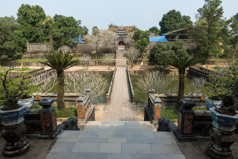 walkway through symmetric gardens