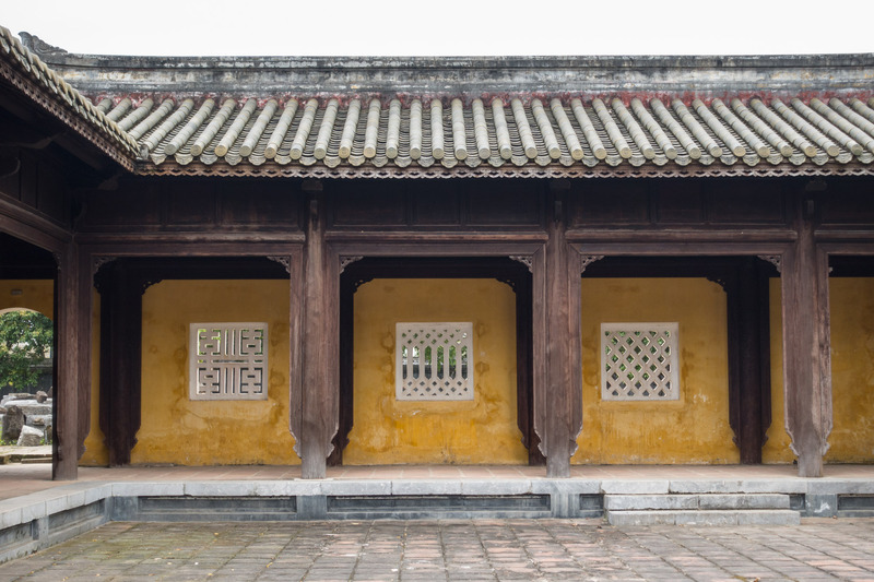 white windows in a yellow corridor