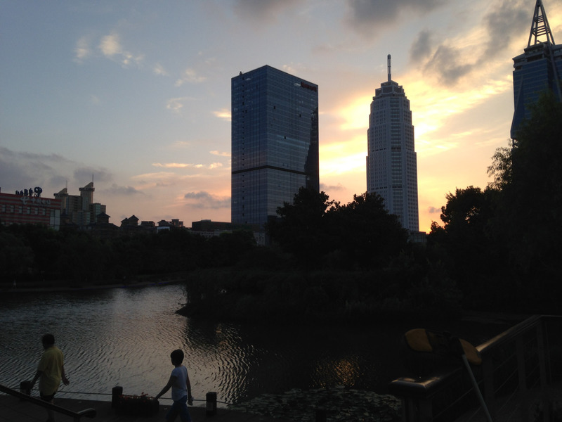 sunset against skyscrapers