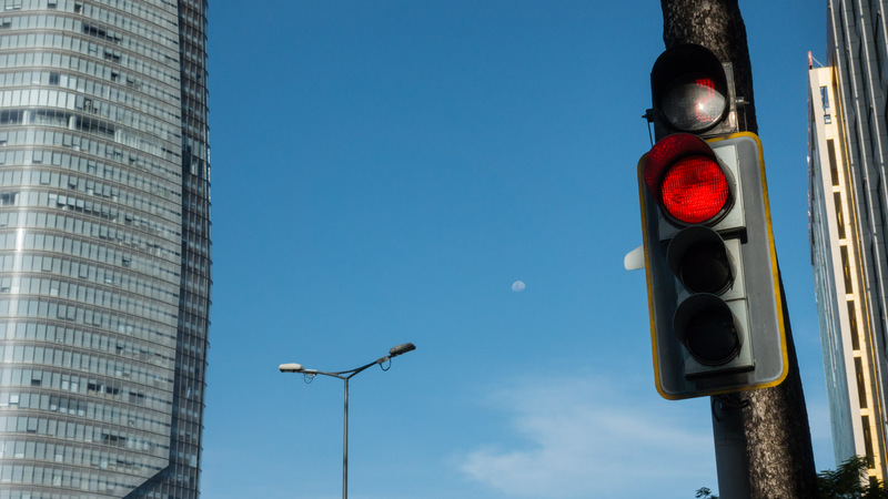 stop light in front of Bitexco Tower