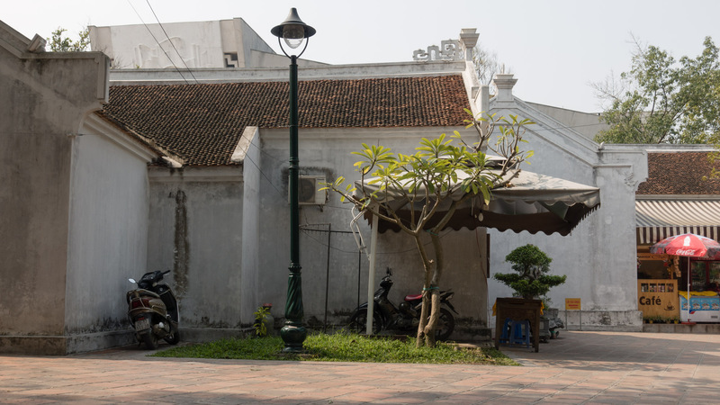 parked motorcycle at the One-Pillar Pagoda