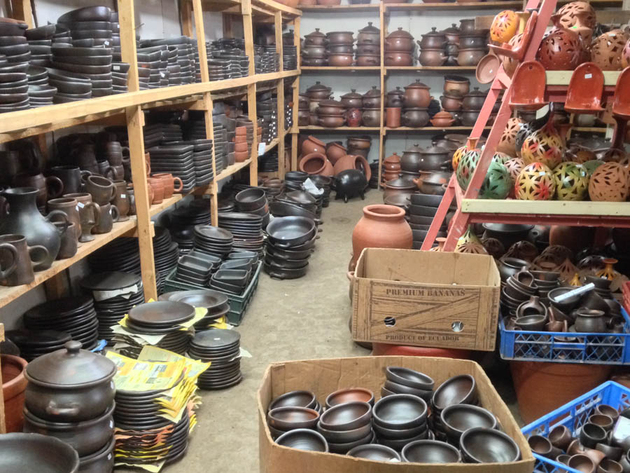 piles of pottery in a shop