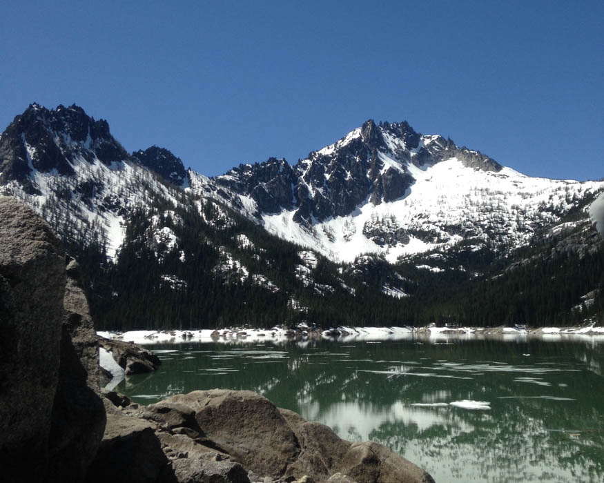 reflections of mountains in Upper Snow Lake