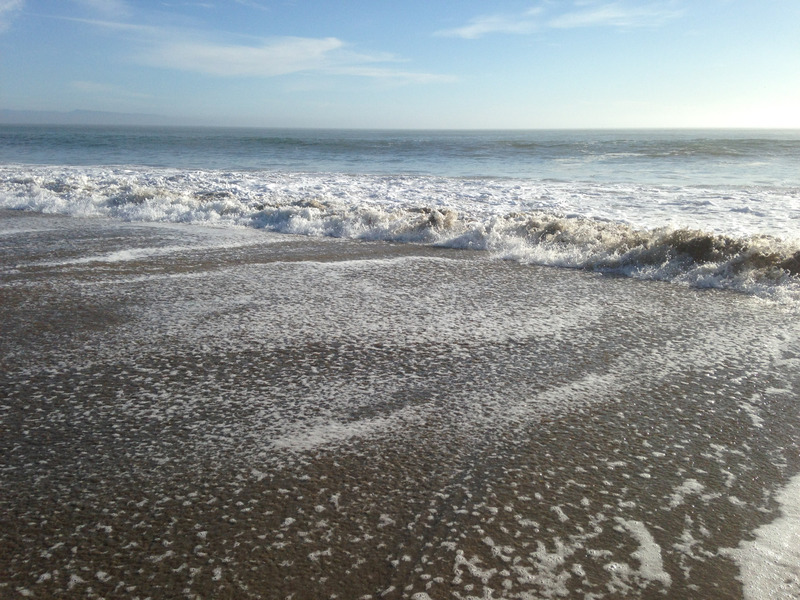 water receding down the sand