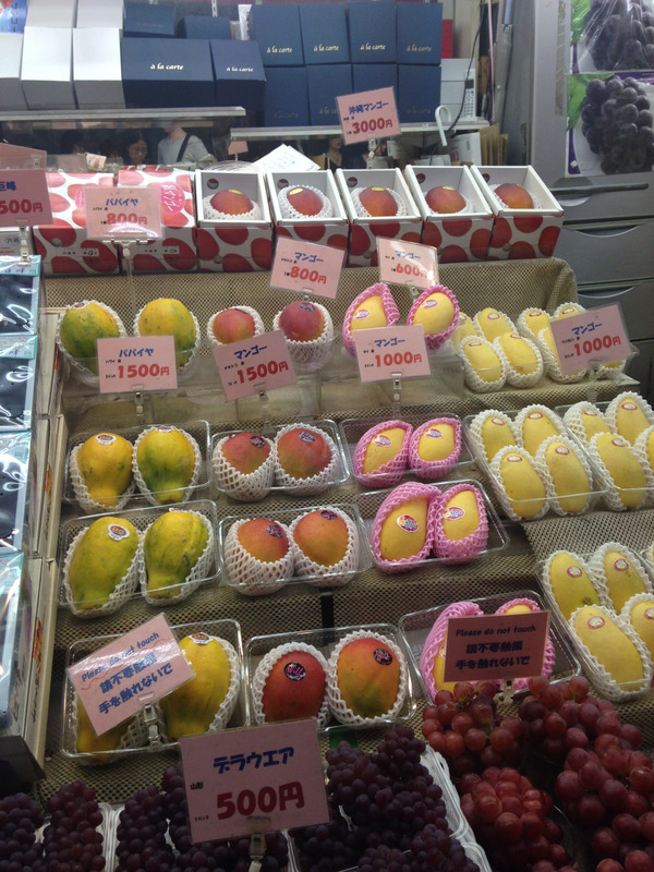 fruit display with mangoes