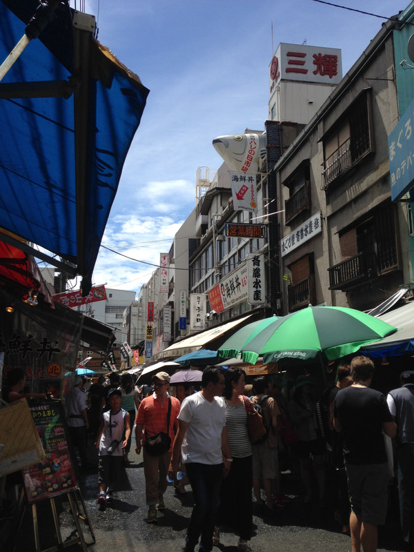 people walking around the market