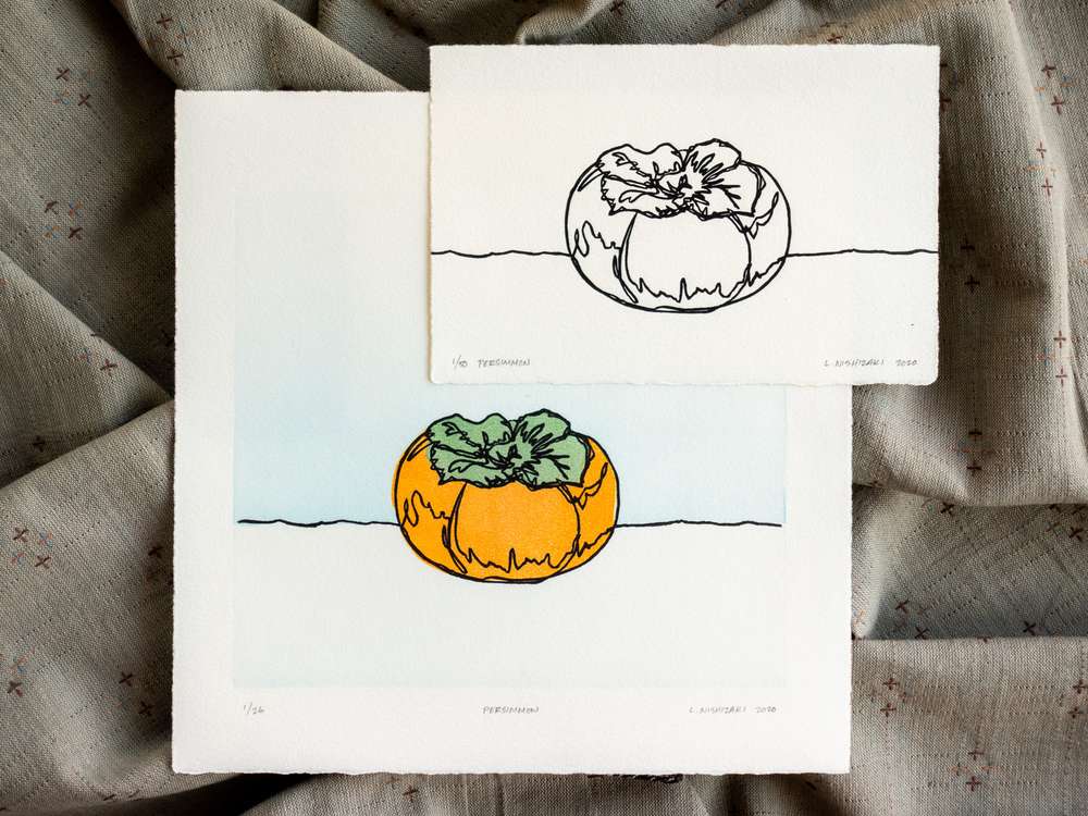 Two prints, one overlaid on the other. The top one is a smaller rectangle with a continuous-line depiction of a persimmon. The bottom print is square with the same persimmon and a colored background.