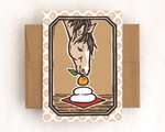 A single card with a brown envelope. The card depicts a blockprinted horse and kagami mochi, with color.